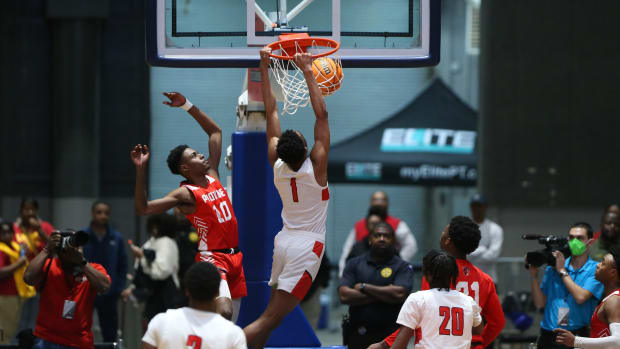 Yazoo City's Tamarion Hoover (1) throws down a dunk against Provine in the Indians' MHSAA State Basketball Tournament win on Feb. 27 at the Mississippi Coliseum.